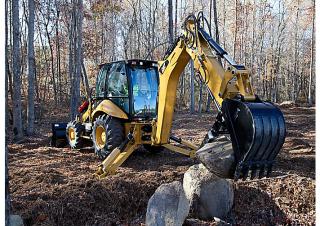 Árokásó-rakodók Caterpillar 430F IT