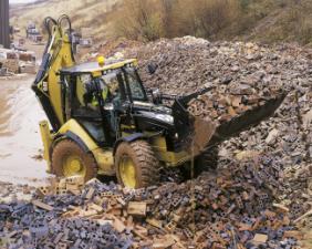 Árokásó-rakodók Caterpillar 444E 4x4