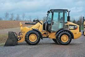 Gumikerekes homlokrakodók Caterpillar 906H