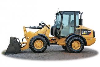Gumikerekes homlokrakodók Caterpillar 906H