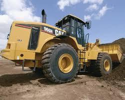 Gumikerekes homlokrakodók Caterpillar 966H