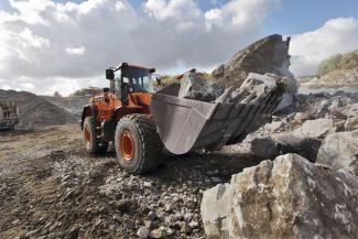 Gumikerekes homlokrakodók Doosan DL 450