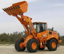 Gumikerekes homlokrakodók New Holland W 170 B