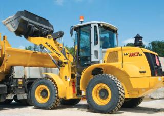 Gumikerekes homlokrakodók New Holland W110B