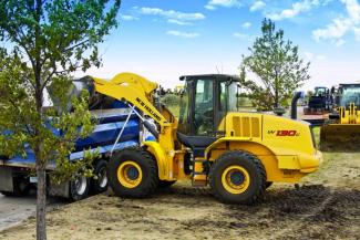 Gumikerekes homlokrakodók New Holland W130C TC