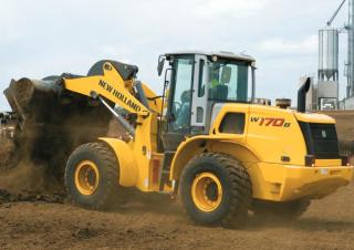 Gumikerekes homlokrakodók New Holland W170B