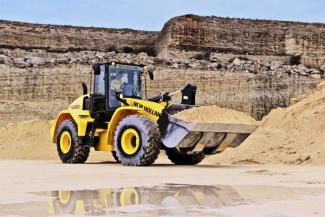 Gumikerekes homlokrakodók New Holland W230C ZB