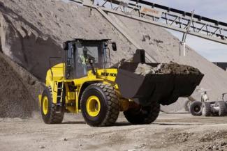 Gumikerekes homlokrakodók New Holland W270C ZB