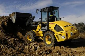 Gumikerekes homlokrakodók New Holland W80B TC