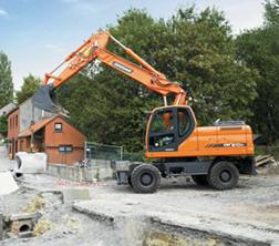 Gumikerekes kotrók Doosan DX210W