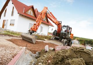 Gumikerekes kotrók Hitachi ZX 140 W 3