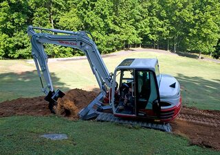 Lánctalpas kotrók Takeuchi TB 285