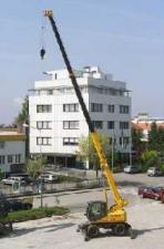 Mobildaruk - teleszkópos gém Sennebogen 613 M