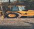 Árokásó-rakodók John Deere Construction 710 B