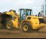 Gumikerekes homlokrakodók New Holland W170B TC