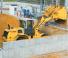 Gumikerekes homlokrakodók New Holland W170B TC