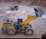 Gumikerekes homlokrakodók Komatsu WA900-3