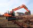 Gumikerekes kotrók Doosan DX 140 W