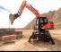 Gumikerekes kotrók Doosan DX140W-5