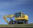 Gumikerekes kotrók Komatsu PW148-10