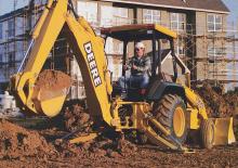Árokásó-rakodók John Deere Construction 310 E