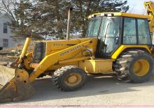 Árokásó-rakodók John Deere Construction 410 D
