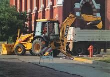 Árokásó-rakodók John Deere Construction 410 E