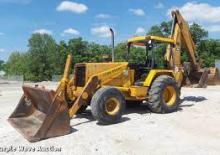 Árokásó-rakodók John Deere Construction 710 C