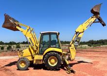 Árokásó-rakodók Komatsu WB 140PS-2