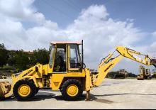 Árokásó-rakodók Komatsu WB92A