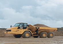 Csuklóvázas dömperek Caterpillar 725