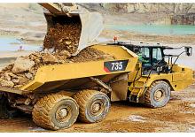 Csuklóvázas dömperek Caterpillar 735