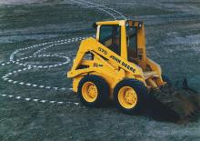 Csúszókormányzású rakodók John Deere Construction 570