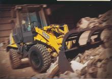 Gumikerekes homlokrakodók John Deere Construction 304 H WH