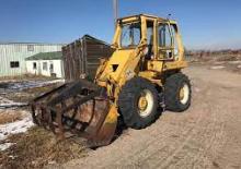 Gumikerekes homlokrakodók International Harvester 3850