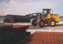 Gumikerekes homlokrakodók John Deere Construction 54 H TC