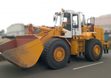 Gumikerekes homlokrakodók Belaz 68010