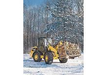 Gumikerekes homlokrakodók Caterpillar 906H