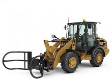 Gumikerekes homlokrakodók Caterpillar 906M
