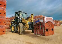 Gumikerekes homlokrakodók Caterpillar 907H