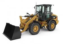 Gumikerekes homlokrakodók Caterpillar 907K