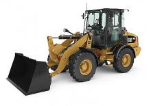 Gumikerekes homlokrakodók Caterpillar 908K