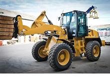 Gumikerekes homlokrakodók Caterpillar 910K