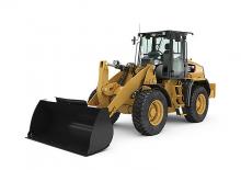 Gumikerekes homlokrakodók Caterpillar 910K