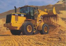 Gumikerekes homlokrakodók Caterpillar 928G