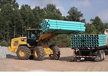 Gumikerekes homlokrakodók Caterpillar 930K