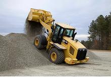Gumikerekes homlokrakodók Caterpillar 938K