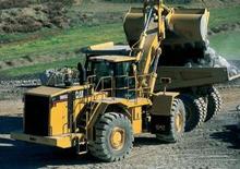 Gumikerekes homlokrakodók Caterpillar 988 G