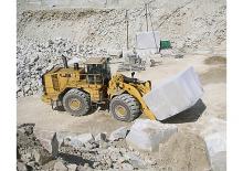 Gumikerekes homlokrakodók Caterpillar 988K