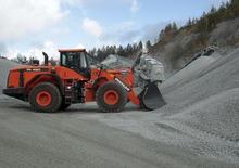 Gumikerekes homlokrakodók Doosan DL 450